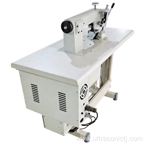 Ultrasonic tablecloth embossing and hemming machine in continuous operation